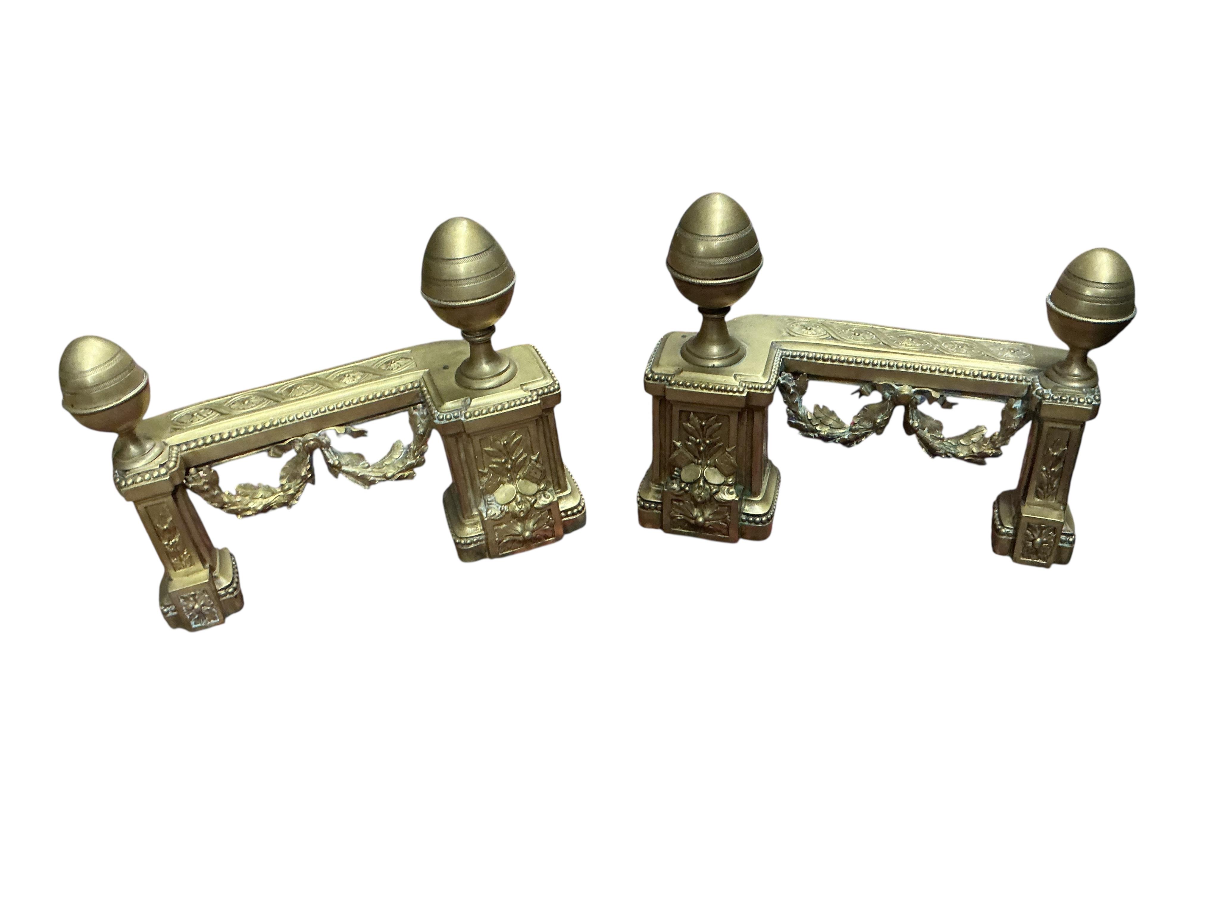 A pair of brass chenet